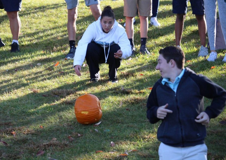 James Snyder '26 runs away from Layla Gilbert's '26 bowling attempt