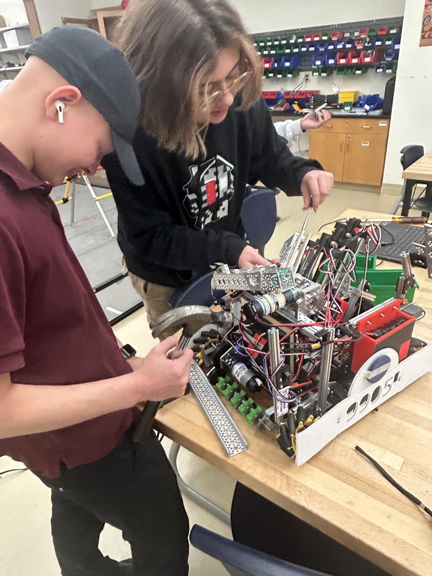 Andy Mai ‘24 and Azael Mayer ‘24 working together on Rampire’s Robot