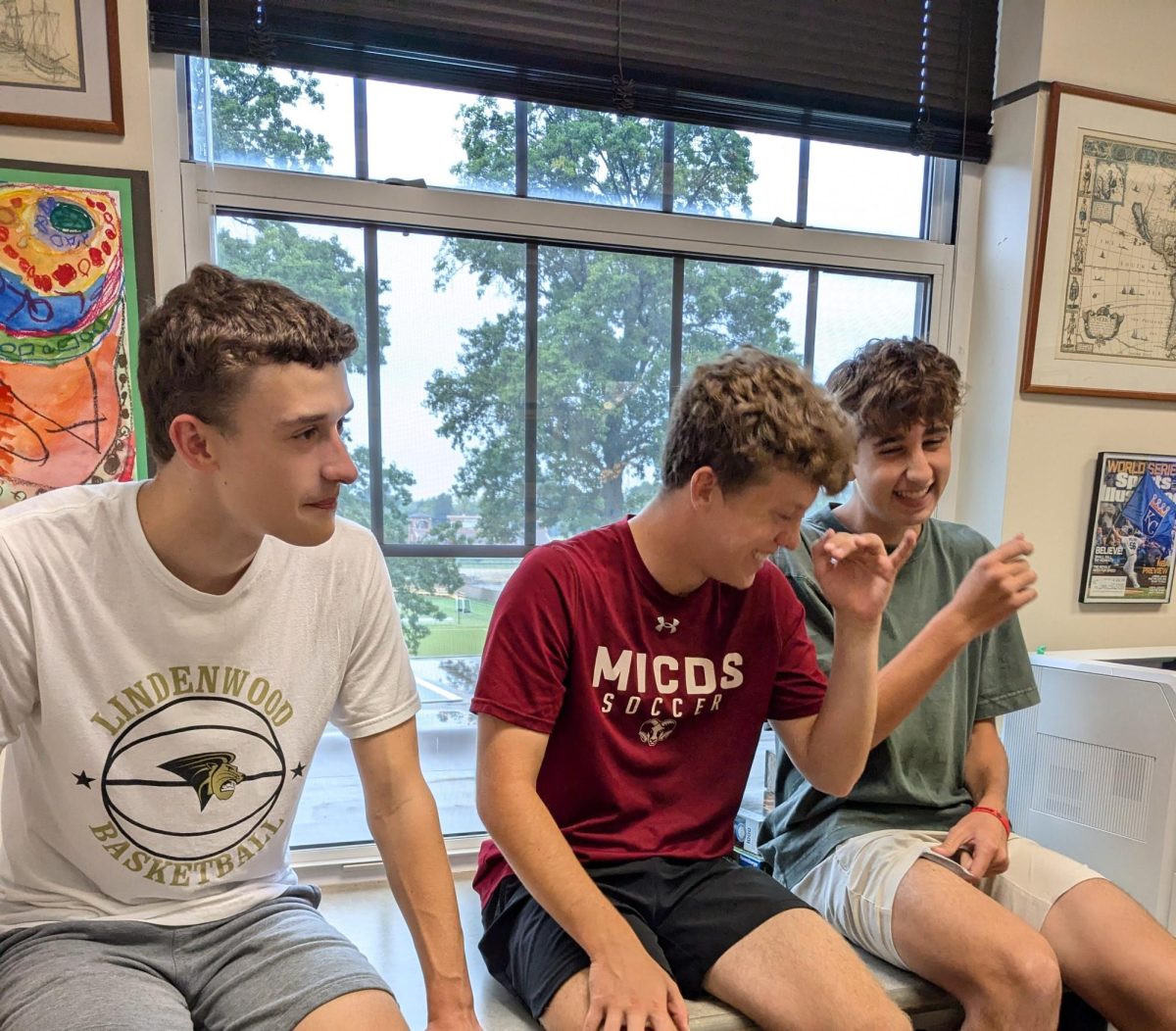 Ian Zar ‘26, Sean Hogan ‘26, and Beckett Joyce ‘26 play a game at a meeting of the Jewish Student Union on September 13, 2024. Faculty members and club co-heads have been adjusting to the no-phone policy and trying different engagement techniques. 
