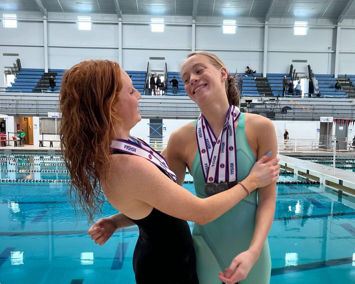 Finishing 3rd overall, Grace Coppel '25 and Nina Schuerer '25 end their senior season with a smile.
