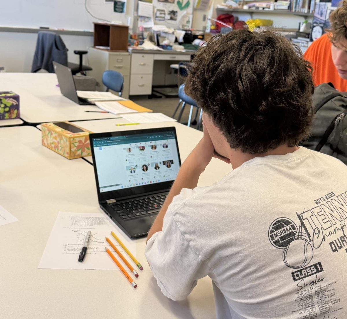Scrolling LinkedIn during class, Owen Kizer ‘26 focuses on gaining connections and networking with his peers April 22.