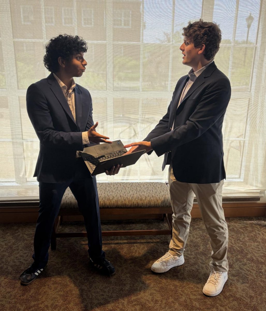 Practicing debating with each other, Senior Speech and Debate members Shaan Patel ‘26 and Lewis Adkins ‘26 prepare for a tournament April 21.