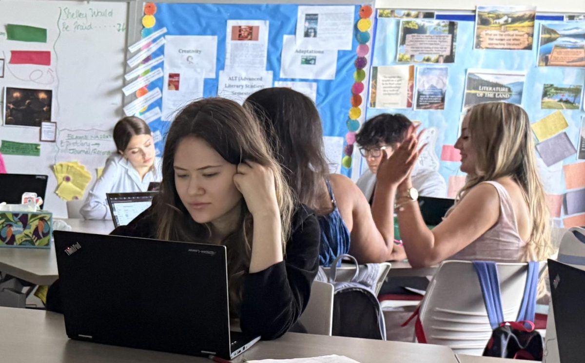 Working on April 22, Isabelle Cox-Garleanu ‘26 prepares to finish her ALT course, a graduation requirement. Seniors will celebrate graduation during the commencement ceremony on Monday, May 18.